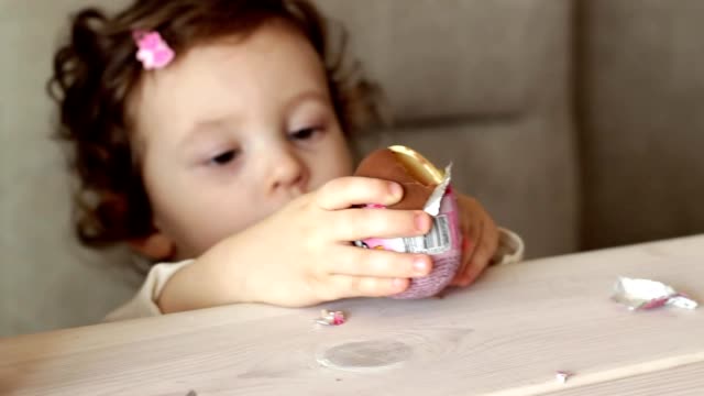 cute-little-girl-with-kinder-surprise-egg