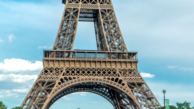 Close-up-view-of-first-section-of-the-Eiffel-Tower-timelapse-in-Paris,-France