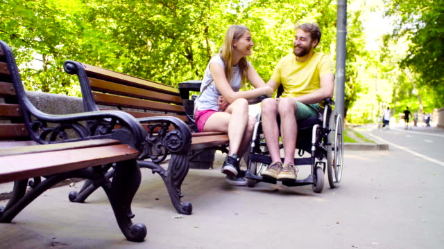 Young-disable-man-with-his-wife-in-the-park