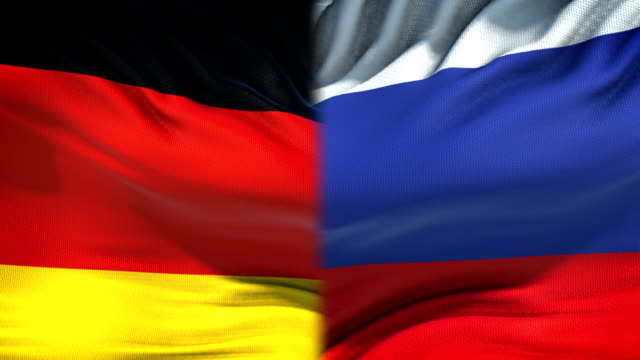 Deutschland-und-Russland-Flaggen-Hintergrund,-diplomatische-und-wirtschaftliche-Beziehungen,-Wirtschaft