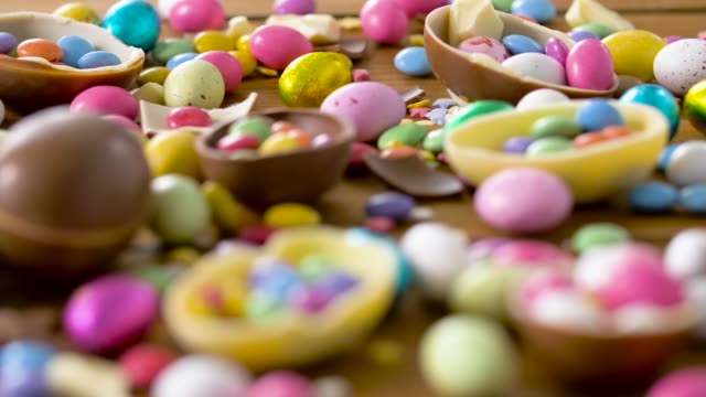 chocolate-easter-eggs-and-drop-candies-on-table