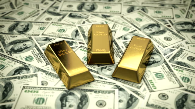 Feine-Goldbarren-auf-USD-Rechnungen