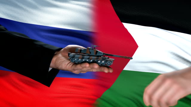 Russia-and-Palestine-officials-exchanging-tank-for-money,-flag-background-weapon
