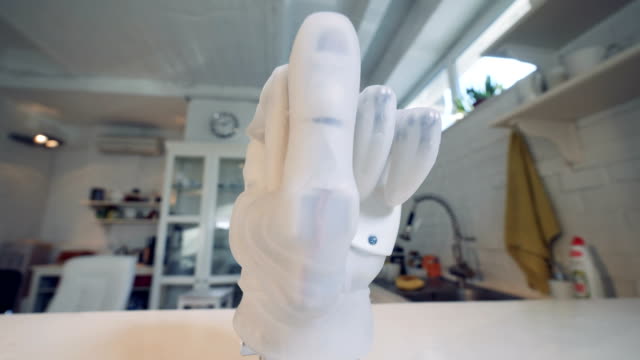 Close-up-of-a-clenched-fist-of-a-robotic-hand