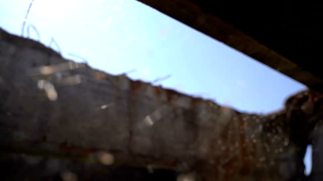 Web-on-an-abandoned-structure.-Slow-motion