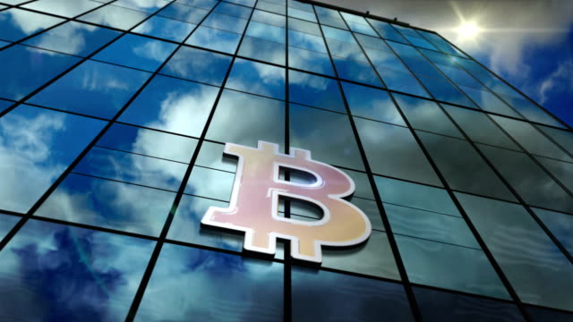 Bitcoin-Blockchain-tecnología-rascacielos-de-cristal-con-animación-de-bucle-de-cielo-reflejado