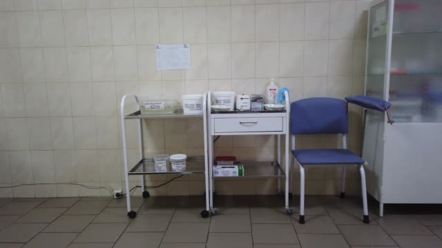 Kiev,-Ukraine,-Europe---November-2019:-The-interior-of-the-vaccination-cabinet.-Stool-for-blood-transfusion.-Vaccination-room-in-the-city-clinic.