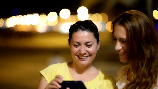 Young-women-enjoying-night-tourism