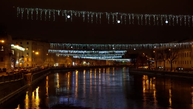 View-on-the-Fontanka-river-at-night-from-Anichkov-bridge.