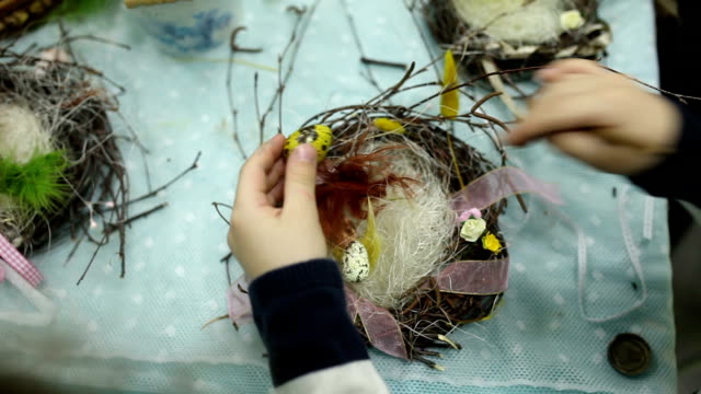 Children-make-a-nest-for-birds,-nest-for-birds