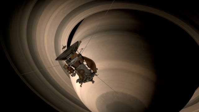 Satellit-Cassini-Saturn-nähert-sich.-Cassini-Huygens-ist-eine-unbemannte-Raumsonde-geschickt,-um-den-Planeten-Saturn.-CG-Animation.-Elemente-dieses-Video-von-der-NASA-eingerichtet.