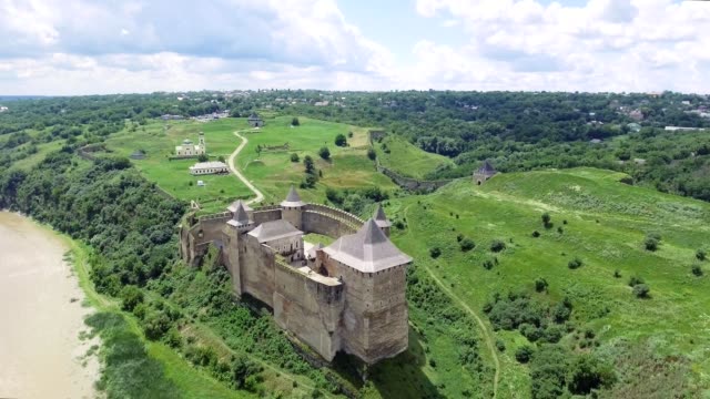 Aerial-Shot.-Old-castle-near-the-RIver.-Hotin-Castle-in-Ukraine.-Eastern-Europe