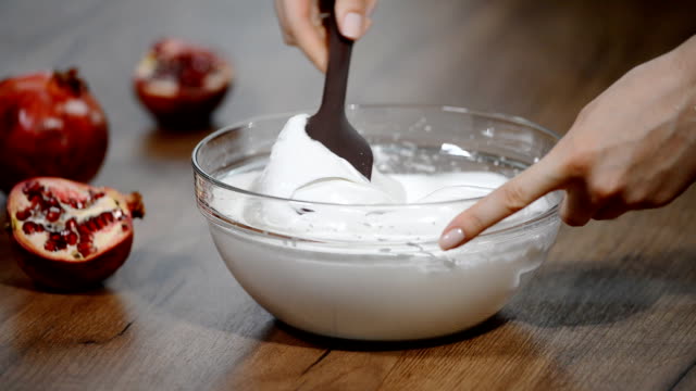 Adding-dry-ingredients-to-the-whipped-egg-whites