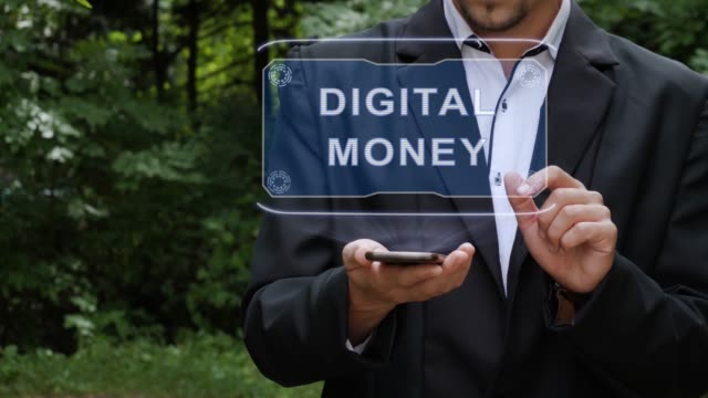 Geschäftsmann-verwendet-Hologramm-mit-Text-Digitales-Geld
