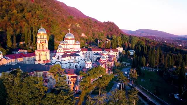 Top-view-of-the-large-Christian-temple.-Clip.-Church-View-from-outside.-The-old-church.-The-stone-church-with-golden-cupolas-at-sunset