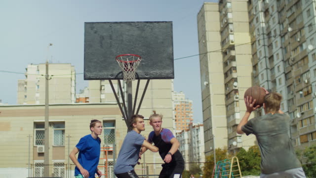 Streetball-players-figthing-for-rebound-on-court