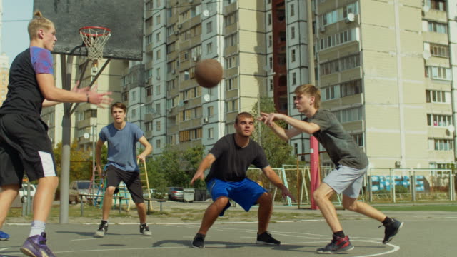 Streetball-player-blocking-shot-from-offensive-player