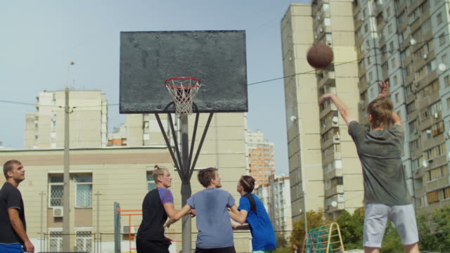 Streetball-player-shooting-for-two-points-on-court