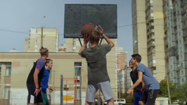 Streetball-player-taking-a-free-throw-on-court