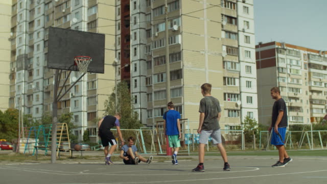 Defender-committing-a-foul-during-streetball-game