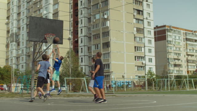 Streetball-player-making-successful-assist-on-court