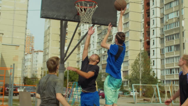 Streetball-player-missing-shot-in-the-paint-on-court