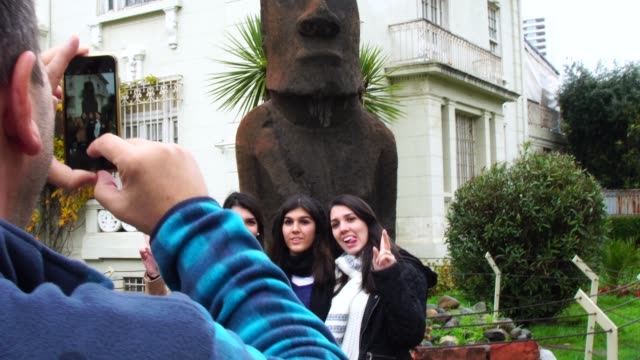 Sisters-taking-photo-in-Vina-del-Mar,-Chile