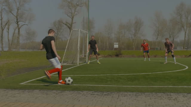 Young-soccer-player-performing-corner-kick