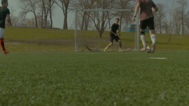 Football-team-scoring-a-goal-during-training-match
