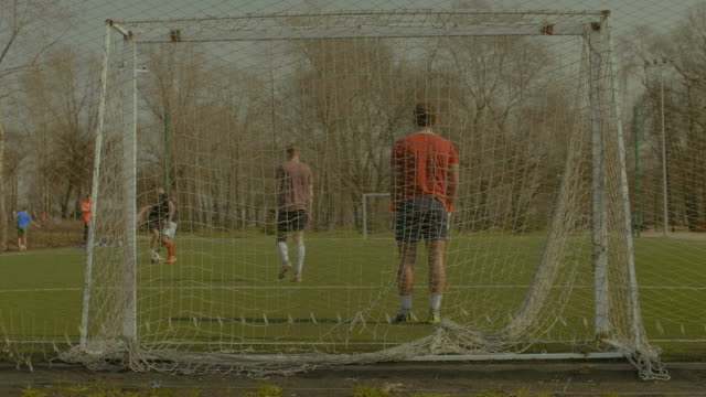 Soccer-goalie-making-a-save-during-football-game