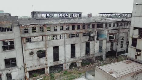 Aerial-view-of-an-old-factory-ruin-and-broken-windows.