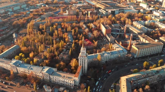 Aerial-panoramic-view-of-midtown-of-Voronezh-city-at-sunset,-Russia.-Famous-buildings-and-urban-architecture-with-roads-and-car-traffic