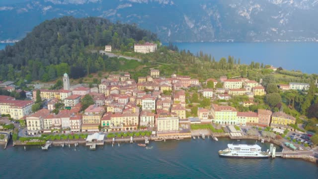 amazing-small-city-on-island-in-big-lake,-panoramic-aerial-view-in-summer-day,-classical-architecture-of-buildings