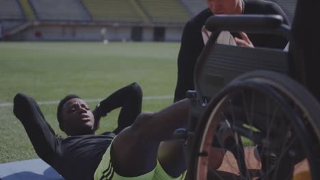 Disabled-athlete-doing-sit-ups