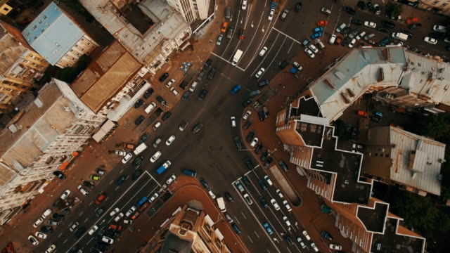 Top-down-aerial-view-of-intersection-with-a-lot-of-cars