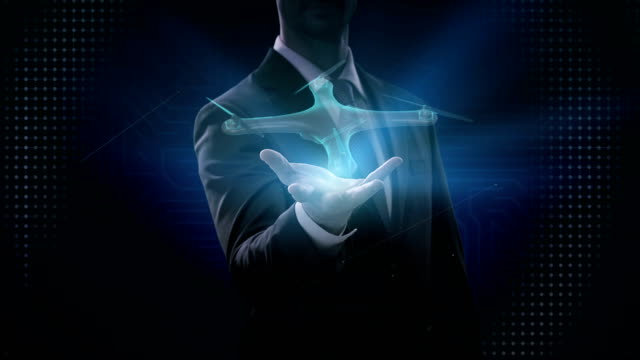 Businessman-opens-palm,-Rotating-Drone,-Quadrocopter,-with-futuristic-user-interface,-Virtual-graphic.-blue-x-ray-image.-4k-movie.