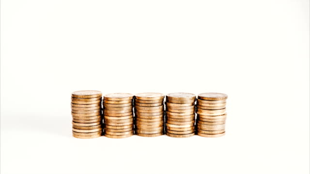 Stop-motion-rising-stack-of-gold-coins,-rising-investment-and-increasing-profits-on-a-white-isolated-background