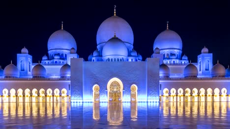 Sheikh-Zayed-Grand-Mosque-illuminated-at-night-timelapse,-Abu-Dhabi,-UAE