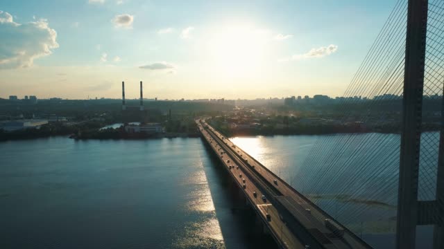 Aerial-drone-footage.-Fly-rise-and-backward-south-bridge-in-kyiv.