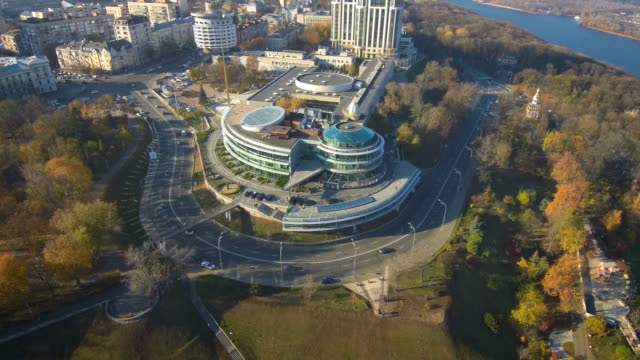 Aerial,-top-view-from-Drone:-timelapse-over-the-road-and-a-beautiful-building