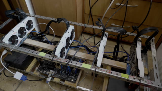 Ethereum-Cryptocurrency-mining-rig-with-four-powerful-video-cards-integrated