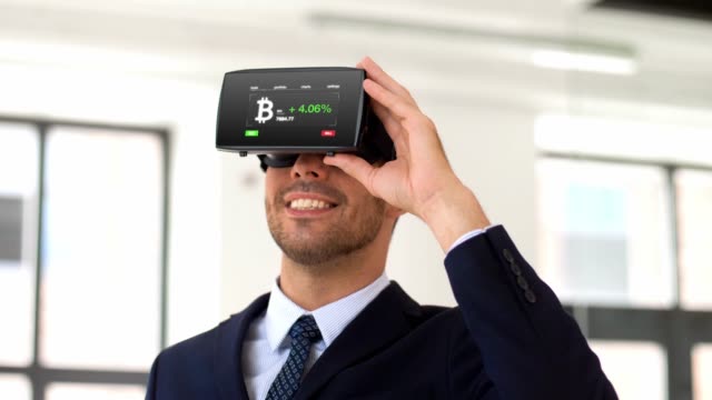 businessman-with-virtual-reality-headset-at-office