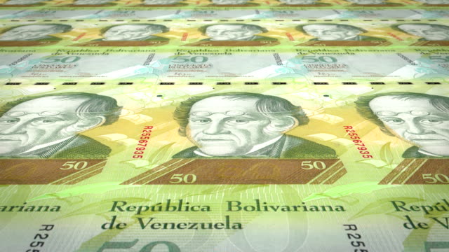 Banknoten-der-venezolanische-Bolivar-hundert-der-Bank-of-Venezuela-Rollen-auf-dem-Bildschirm,-Münzen-der-Welt,-Bargeld,-Schleife