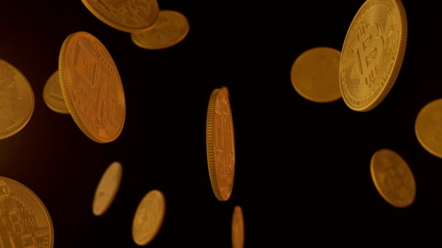 Set-of-rotating-golden-bitcoin-on-black-background-with-alpha-channel.
