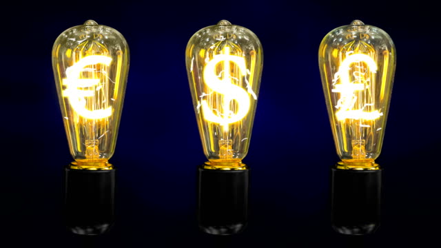 Lamps-that-glow-symbols-of-world-currencies.