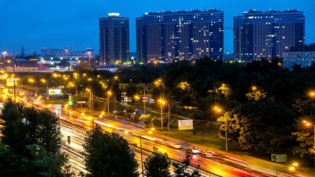night-panoramic-view-of-traffic-and-Windows-of-houses-on-the-outskirts-of-the-metropolis,-time-lapse