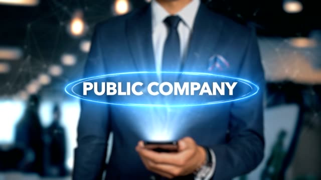 Businessman-With-Mobile-Phone-Opens-Hologram-HUD-Interface-and-Touches-Word---PUBLIC-COMPANY