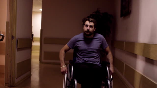 A-disabled-man-in-a-wheelchair-in-the-rehabilitation-center