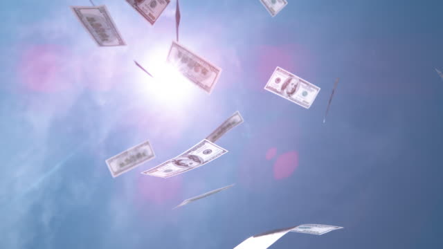 SLOW-MOTION-CLOSE-UP:-Fortune-of-money-falling-from-the-sky.-Winning-lottery