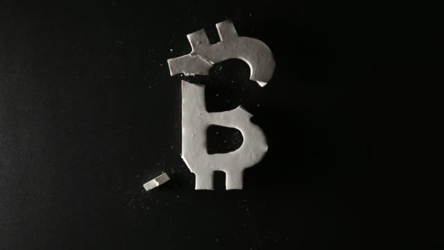 Gips-Bitcoin-Symbol-fällt-und-bricht